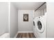 Functional laundry room with modern washer and dryer, perfect for convenient chores at 9951 Winona St, Westminster, CO 80031