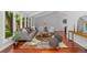 Bright and stylish living room with vaulted ceilings, cozy seating, and hardwood floors at 9951 Winona St, Westminster, CO 80031