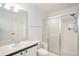 Bright bathroom featuring modern shower, vanity and fixtures at 6911 Chestnut Ct, Parker, CO 80134