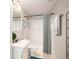This clean bathroom features a shower-tub combination, vanity sink, and ample storage at 6911 Chestnut Ct, Parker, CO 80134