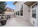 Wood deck with grill and access door looking out to the yard at 6911 Chestnut Ct, Parker, CO 80134