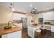 Well-equipped kitchen featuring modern stainless steel appliances, granite counters, and ample cabinet space for storage at 6911 Chestnut Ct, Parker, CO 80134