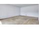 Clean and bright bedroom with neutral carpet, ready for your personal touch and decor at 3022 Blackhawk St, Aurora, CO 80011