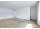 Spacious living room featuring neutral carpet and ample natural light, perfect for gatherings at 3022 Blackhawk St, Aurora, CO 80011
