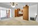 Open living area leading to the kitchen, bathed in natural light, and perfect for entertaining at 3022 Blackhawk St, Aurora, CO 80011