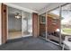 Relaxing sun room with sliding glass doors leading inside and out to the beautiful patio at 3022 Blackhawk St, Aurora, CO 80011