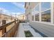 Backyard featuring a concrete patio, lawn, and a wooden fence, perfect for outdoor relaxation at 21210 E Radcliff Pl, Aurora, CO 80015