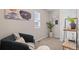 Inviting reading room with comfortable seating, decorative accents, and great lighting at 21210 E Radcliff Pl, Aurora, CO 80015