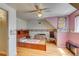 Cozy room with a ceiling fan and playful decor at 6971 S Valentia St, Centennial, CO 80112