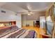Spacious bedroom with hardwood floors, a ceiling fan, and a cozy atmosphere perfect for relaxation and comfort at 6971 S Valentia St, Centennial, CO 80112