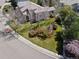 Aerial view of the property showcasing the manicured lawn and mature landscaping at 9734 Tall Grass Cir, Lone Tree, CO 80124
