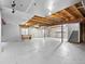 Unfinished basement with exposed beams and concrete walls offering potential for customization at 9734 Tall Grass Cir, Lone Tree, CO 80124