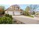 Charming two-story home featuring a three-car garage and well-maintained landscaping at 9734 Tall Grass Cir, Lone Tree, CO 80124