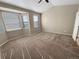 Spacious bedroom featuring a large bay window and plush carpeting at 1220 W 170Th Ave, Broomfield, CO 80023