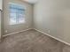 Bright bedroom featuring a large window offering plenty of natural light at 1220 W 170Th Ave, Broomfield, CO 80023
