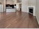 Open living space with a fireplace, kitchen, and ample room for entertaining at 1220 W 170Th Ave, Broomfield, CO 80023