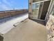 Concrete patio extends to fenced backyard at 1220 W 170Th Ave, Broomfield, CO 80023