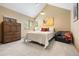 Comfortable bedroom with vaulted ceiling and a large window offering a view at 33095 Bergen Mountain Rd, Evergreen, CO 80439
