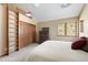 Bedroom featuring a loft ladder, closet, and window with a view at 33095 Bergen Mountain Rd, Evergreen, CO 80439