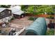 Aerial view of backyard and features including a tarped structure and a patio at 147 Wallace St, Northglenn, CO 80234