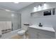 Bright bathroom with a shower, toilet, and vanity, providing a clean and functional space at 147 Wallace St, Northglenn, CO 80234