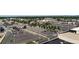 Extensive aerial view of a vast commercial area with parking lots, streets, shops and distant mountain views at 147 Wallace St, Northglenn, CO 80234