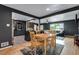 Spacious living area showcasing an open floor plan with a kitchen, dining area, and living room at 147 Wallace St, Northglenn, CO 80234