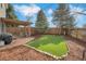 Charming outdoor area with a brick patio, mature trees, and a cozy seating area at 20000 Mitchell Pl # 9, Denver, CO 80249
