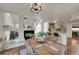 A spacious dining area connects seamlessly to the kitchen, fireplace, and upstairs at 20000 Mitchell Pl # 9, Denver, CO 80249