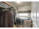 Functional laundry room with modern washer and dryer units, providing convenience for laundry tasks at 20000 Mitchell Pl # 9, Denver, CO 80249