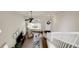 Bright living room with a ceiling fan, large window, and comfortable seating arrangement perfect for relaxing at 20000 Mitchell Pl # 9, Denver, CO 80249