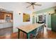 The beautiful dining room features stylish decor and an open view to the kitchen at 4403 Alcott St, Denver, CO 80211