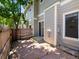 Private backyard with patio space, wooden fence, and natural stone at 9024 Gale Blvd # 3, Thornton, CO 80260