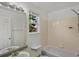 Bright bathroom with window, shower, and double sink at 9024 Gale Blvd # 3, Thornton, CO 80260