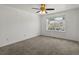 Bright bedroom with large window and a ceiling fan at 9024 Gale Blvd # 3, Thornton, CO 80260