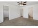 Spacious bedroom featuring a ceiling fan and closet at 9024 Gale Blvd # 3, Thornton, CO 80260