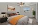Serene main bedroom featuring a large window, plush carpet, and contemporary decor at 9024 Gale Blvd # 3, Thornton, CO 80260