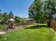 Community playground and green space with trees and play equipment at 9024 Gale Blvd # 3, Thornton, CO 80260