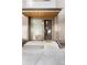 Front door with modern design and welcoming Hello doormat at 2110 Decatur St, Denver, CO 80211