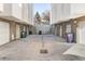 Rear parking area between modern condos at 2110 Decatur St, Denver, CO 80211
