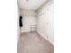 Spacious walk-in closet with carpeted floors and shelving at 2110 Decatur St, Denver, CO 80211