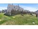 Beautiful backyard of house has green grass at 10715 Foxwood Ct, Parker, CO 80138