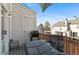 Cozy balcony with a grill and seating area perfect for relaxing outdoors at 10715 Foxwood Ct, Parker, CO 80138