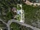Aerial view of property showcasing main house and cabins with property lines outlined at 63 Sillasen Ln, Golden, CO 80403