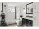 Stylish bathroom with a shower, vanity, and sleek fixtures, offering a spa-like experience at 63 Sillasen Ln, Golden, CO 80403