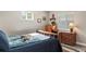 Cozy bedroom with wood furnishings, desk, and bright natural light at 63 Sillasen Ln, Golden, CO 80403