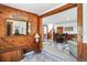 Inviting entryway with wood paneling, stylish decor, and seamless access to the home's living areas at 63 Sillasen Ln, Golden, CO 80403