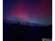 Beautiful purple and pink sky at night, lights in the distance at 63 Sillasen Ln, Golden, CO 80403