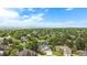 Gorgeous aerial view of neighborhood with mature trees at 16301 E Ida Ave, Centennial, CO 80015