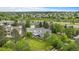 Stunning aerial view of a beautiful home with a meticulously landscaped backyard, showcasing the property's curb appeal at 16301 E Ida Ave, Centennial, CO 80015